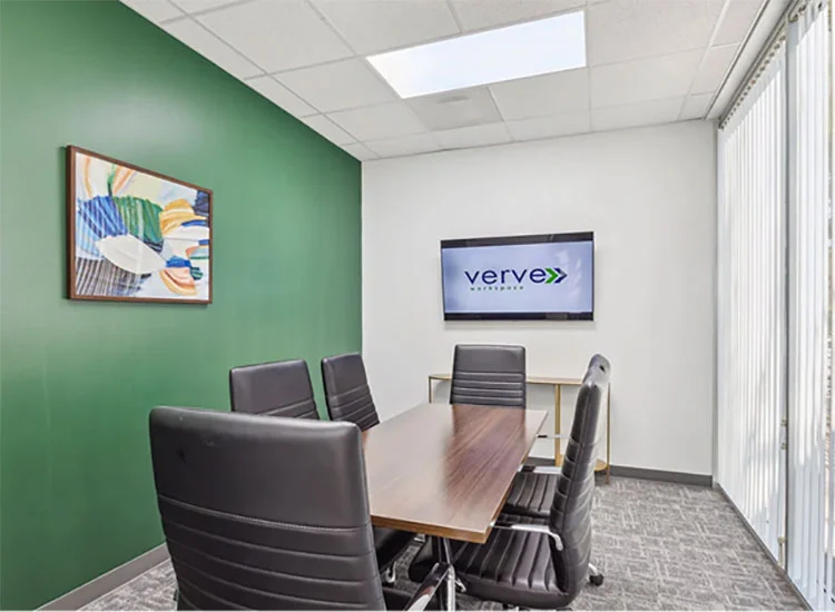 Private office with desk and window in Verve Workspace The Woodlands