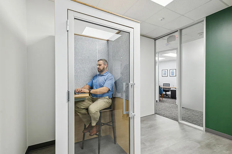 Private office with desk and window in Verve Workspace The Woodlands